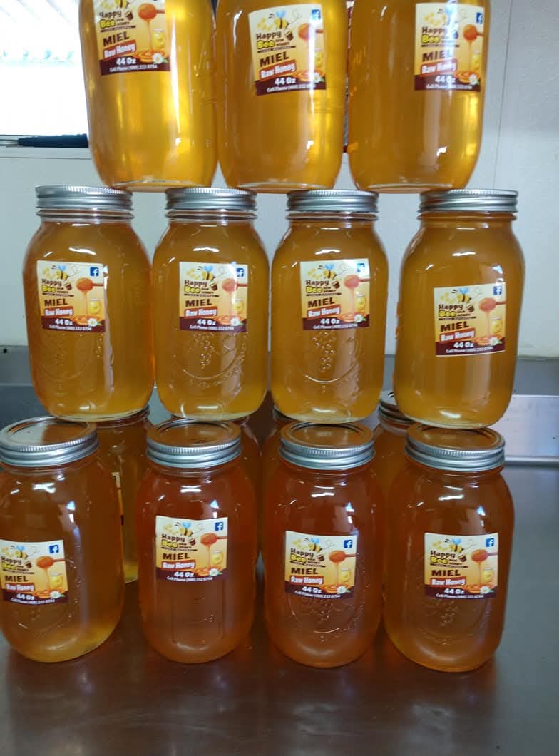 11 jars of Happy Bee local raw honey